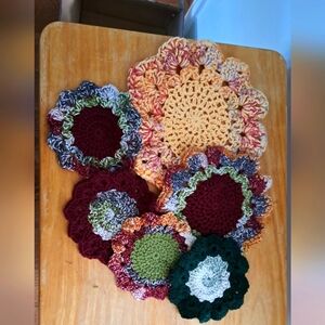 Handmade crochet hotpads/dishcloths and 4 coasters. Nice warm colors